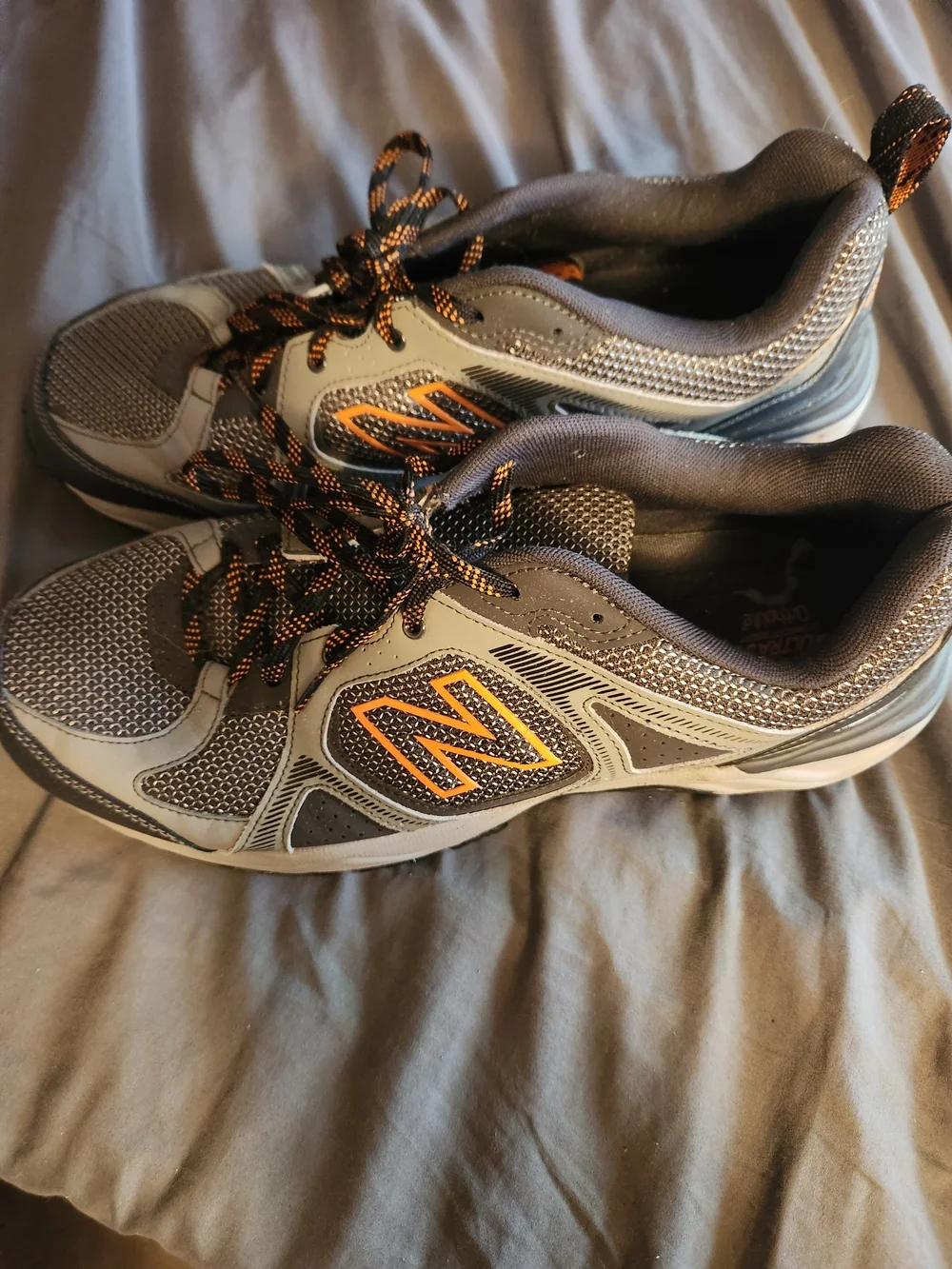New Balance Men’s Gray Athletic Shoes with Orange Accents